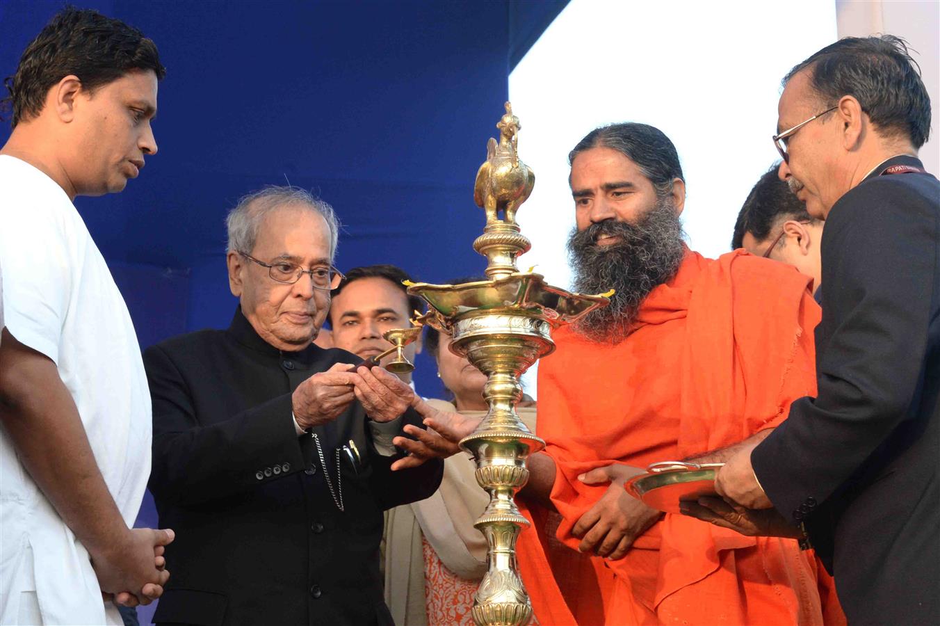 The President of India, Shri Pranab Mukherjee lighting the lamp at the inauguration of the Yoga Shivir at Dr. RPSV Sports Ground in Rashtrapati Bhavan on February 18, 2017.