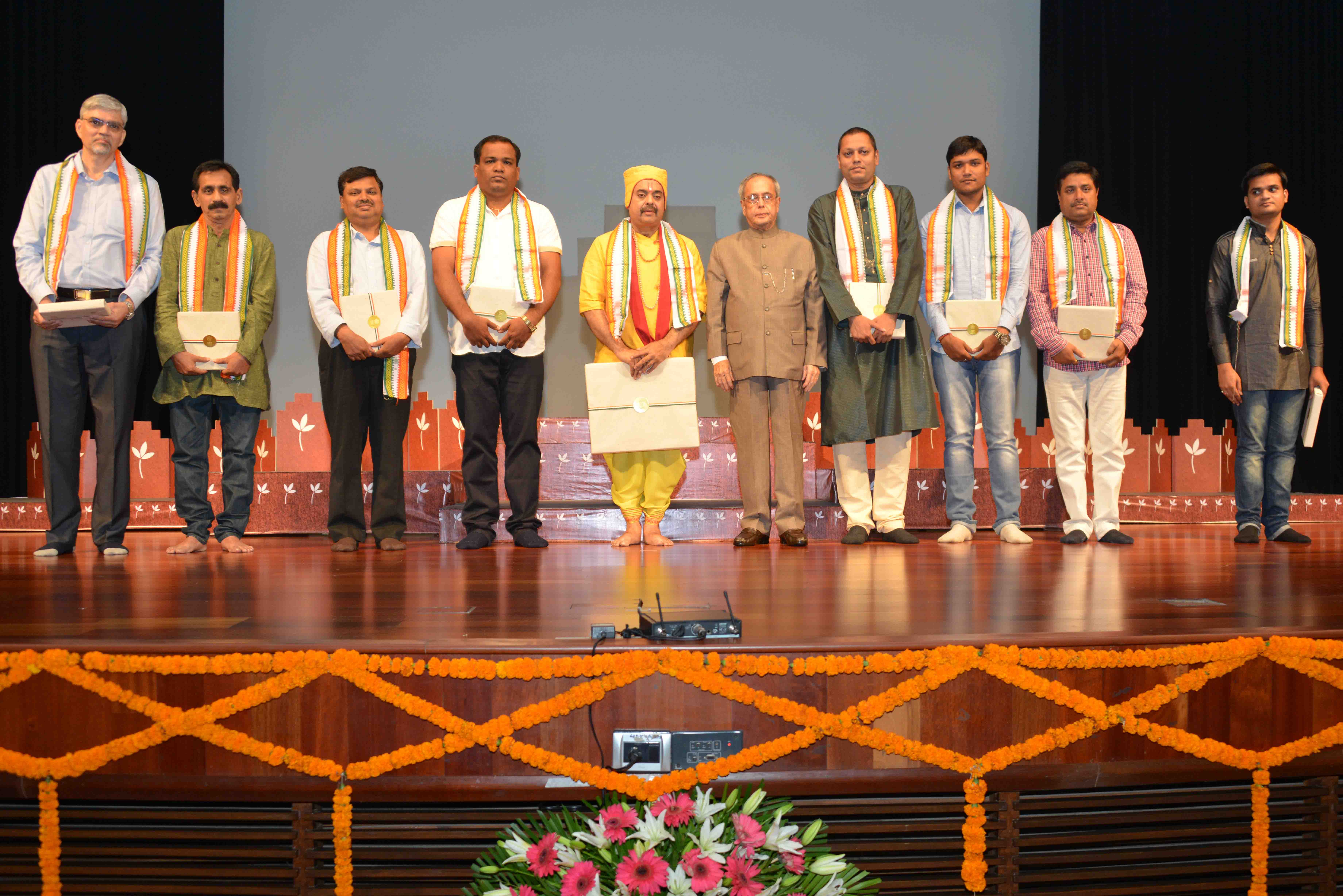 The President of India, Shri Pranab Mukherjee with the artists after witnessing a musical mono act on the Life of 'Soordas' by Shri Shekhar Sen at Rashtrapati Bhavan Cultural Centre on April 11, 2015.