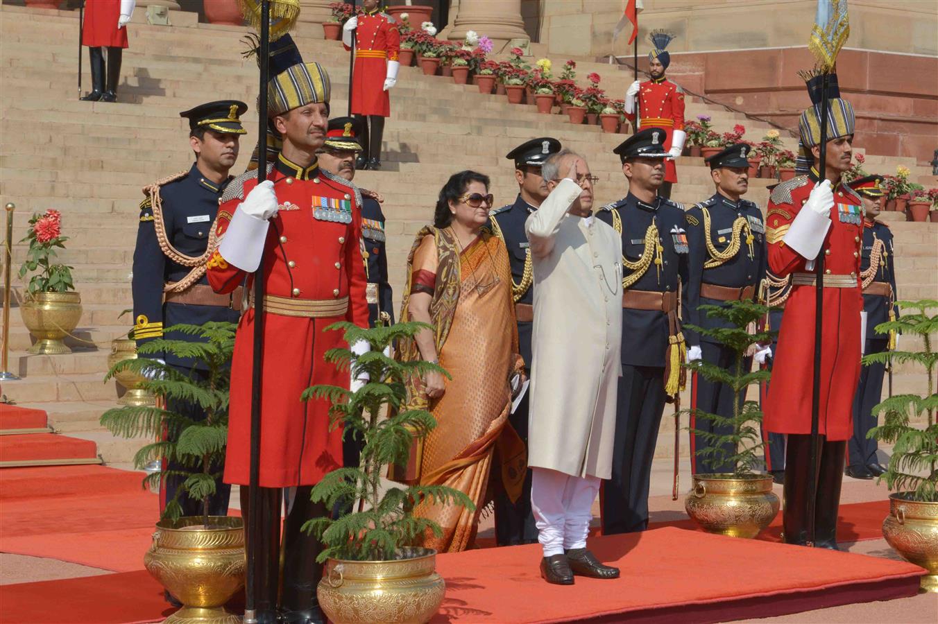 The President of India, Shri Pranab Mukherjee receiving the National Salute from the President's Body Guard (PBG) at Forecourt of Rashtrapati Bhavan before leaving for Central Hall of Parliament to deliver his address to both the Houses of Parliament in N 