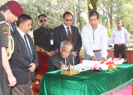 The President of India, Shri Pranab Mukherjee singing the Visitor's Book in National Martyr's Memorial at Savar in Dhaka, Bangladesh on March 3, 2013.