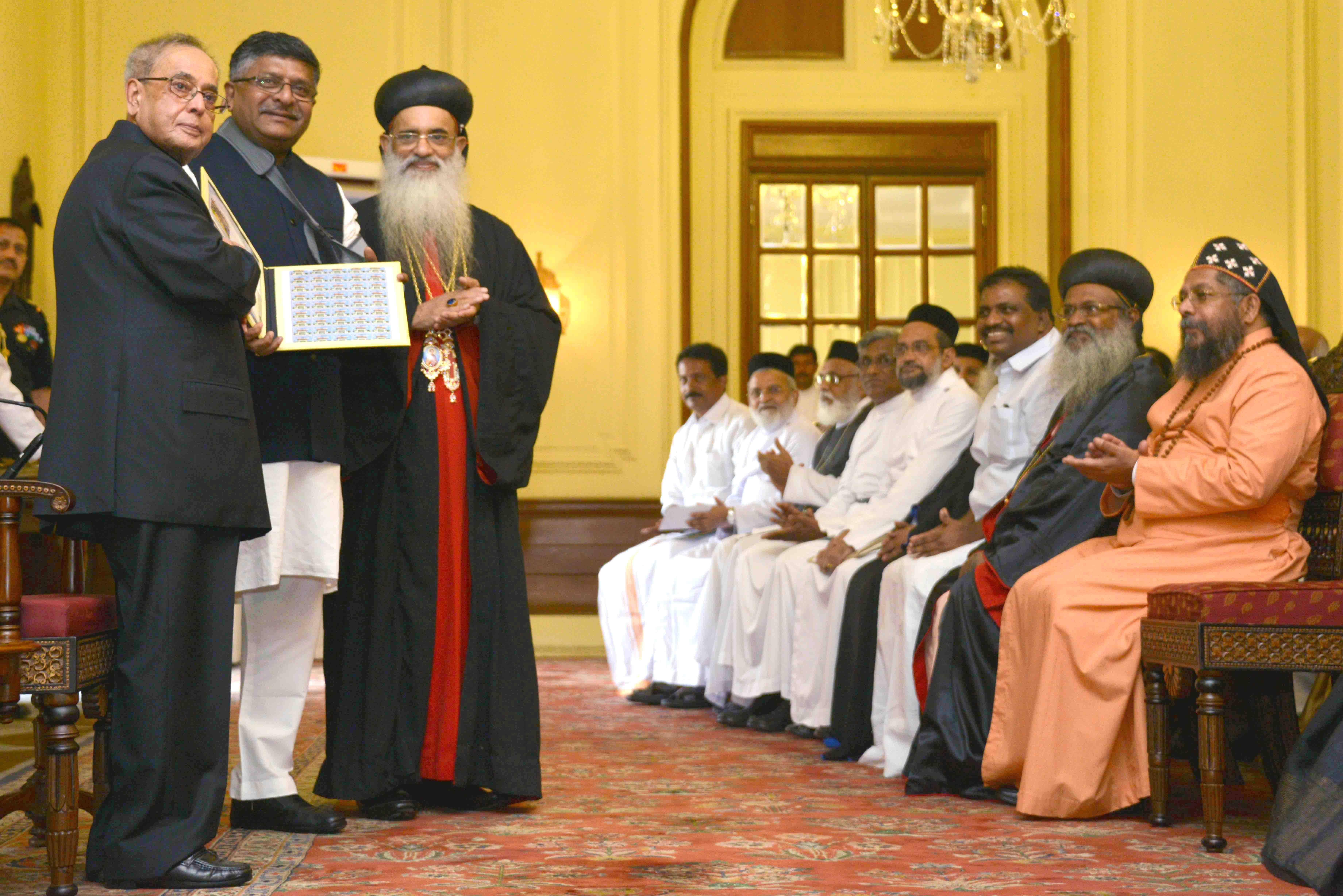 The President of India Shri Pranab Mukherjee releasing a Postage Stamp commemorating the 200 years of the Orthodox Theological Seminary or Old Seminary, Kottayam, Kerala at Rashtrapati Bhavan on April 21, 2015.