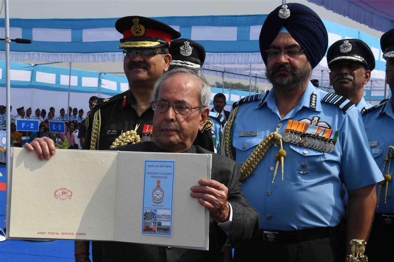 The President of India, Shri Pranab Mukherjee releasing a special cover and Brochure at the presentation of the Standard to 125 (H) Sqn and Colours to Mechanical Training Institute of Indian Air Force at Air Force Station, Tambaram in Tamil Nadu on March