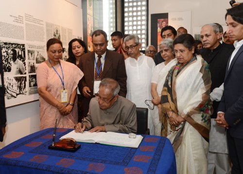 The President of India, Shri Pranab Mukherjee signing the Visitor's Book after visiting the Bangabandhu Memorial Museum at Dhaka, Bangladesh on March 4, 2013.