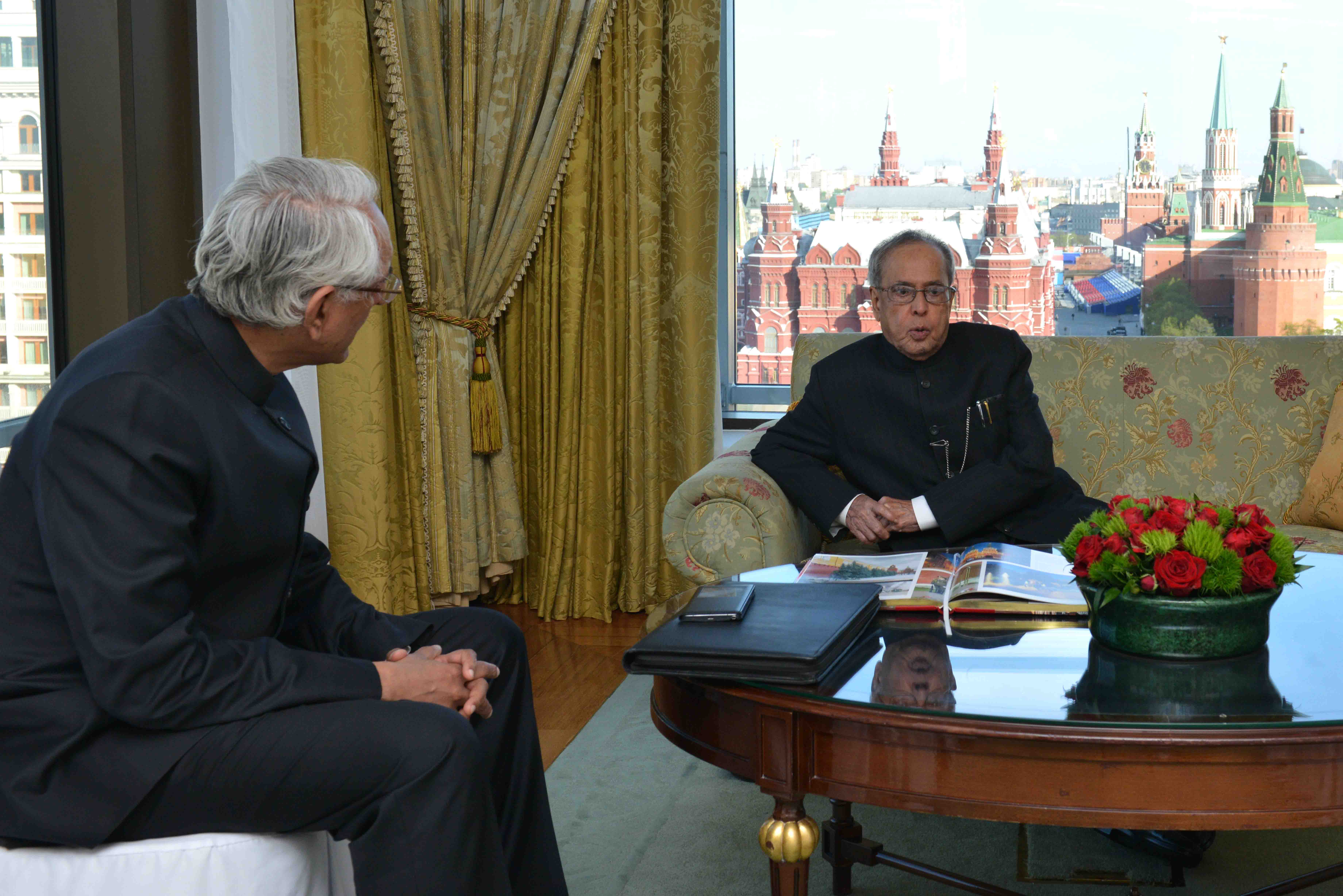 The President of India, Shri Pranab Mukherjee interacting with the Ambassador of India to Russia, Shri P.S. Raghavan at Hotel Ritz-Carlton in Moscow on May 7, 2015.