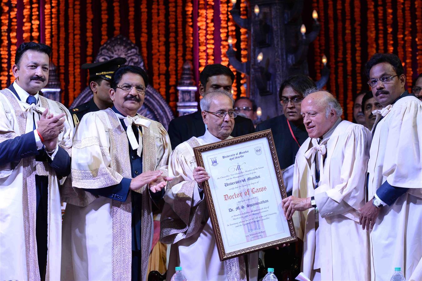 The President of India, Shri Pranab Mukherjee conferring the Honorary D. Litt on Dr. M.S. Swaminathan at a Special Convocation of the University of Mumbai at Mumbai in Maharashtra on March 17, 2017.