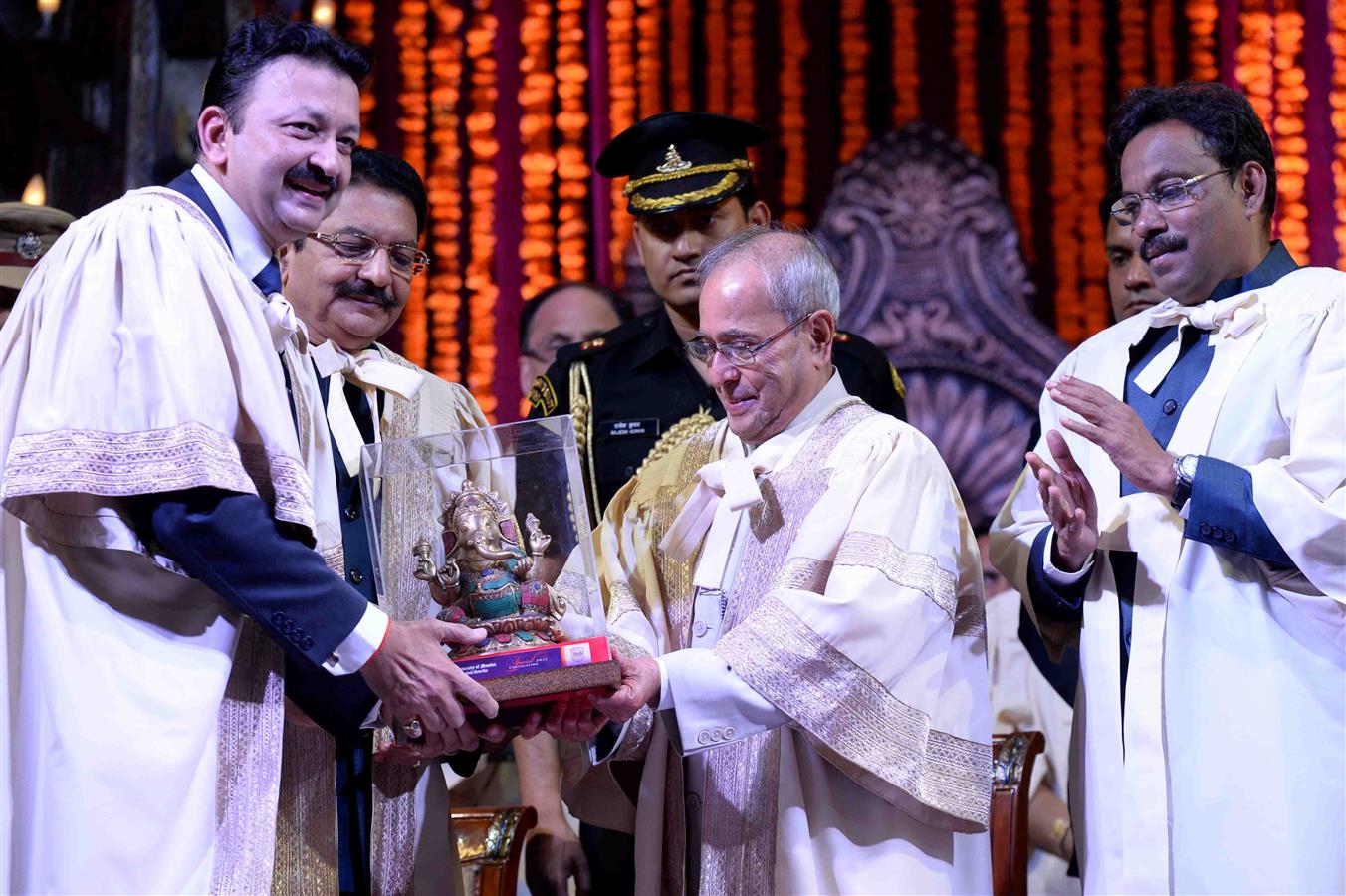 The President of India, Shri Pranab Mukherjee being felicitated by the Vice Chancellor of University of Mumbai at the Special Convocation of University of Mumbai at Mumbai in Maharashtra on March 17, 2017.