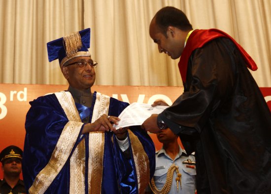 The President of India, Shri Pranab Mukherjee while presenting a degree to the student at the XXXIII Convocation of Postgraduate Institute of Medical Education & Research at Chandigarh in Punjab on March 15, 2013.