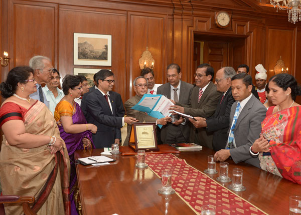 The President of India, Shri Pranab Mukherjee with the delegation from Bangladesh Hindu Buddhist Christian Unity Council (BHBCUC), USA led by Shri Sitangshu Guha at Rashtrapati Bhavan in New Delhi on April 21, 2014. 