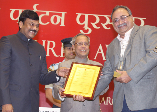 The President of India, Shri Pranab Mukherjee while presenting the National Tourism Awards in various categories at Vigyan Bhawan, New Delhi on March 18, 2013. Also seen is the Union Minister of State for Tourism (Independent Charge), Dr. K. Chiranjeevi.