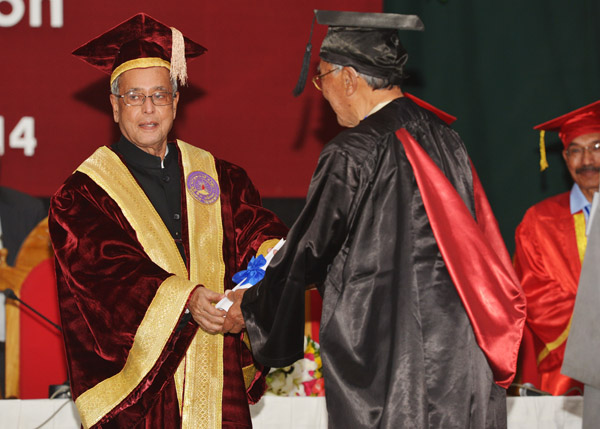 The President of India, Shri Pranab Mukherjee conferring the Doctor of Law to Shri Rishang Keishing on the occasion of the 14th Convocation of Manipur University at Canchipur in Imphal, Manipur on April 29, 2014. 