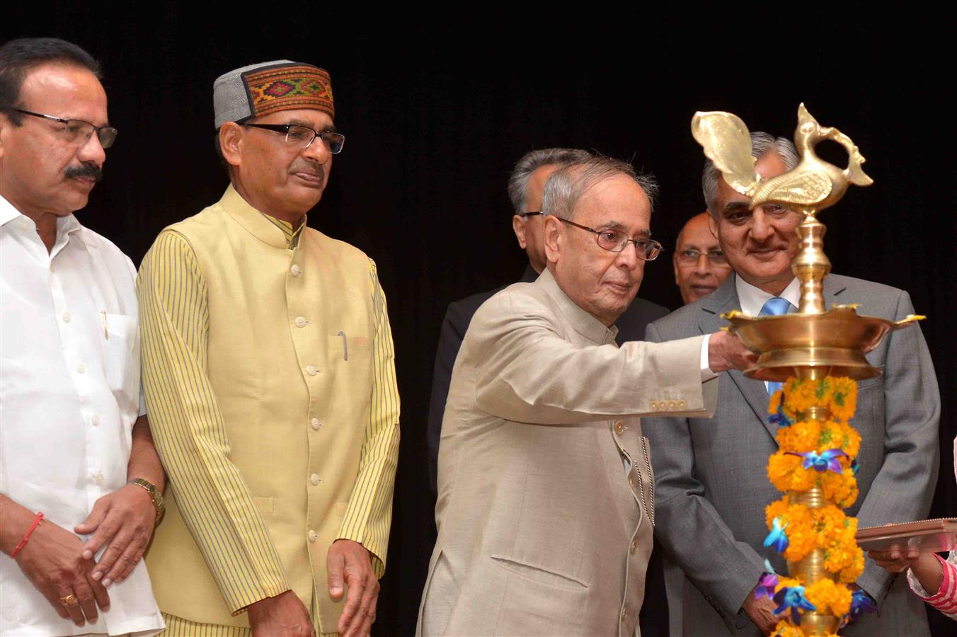 The President of India, Shri Pranab Mukherjee lighting the lamp at the inauguration of the Fourth Retreat of Judges of the Supreme Court at the National Judicial Academy in Bhopal on April 16, 2016. 