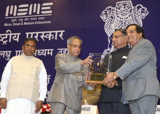 The President of India, Shri Pranab Mukherjee presenting National Awards to Micro, Small and Medium Enterprises (MSME) and Banks at Vigyan Bhavan in New Delhi on April 3, 2013. Also seen is the Union Minister of State (Independent Charge) for Micro, Small