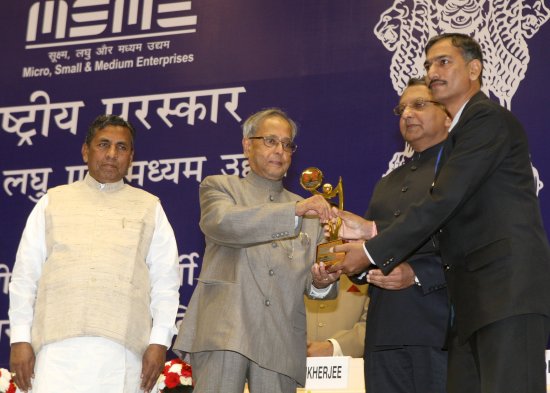 The President of India, Shri Pranab Mukherjee presenting National Awards to Micro, Small and Medium Enterprises (MSME) and Banks at Vigyan Bhavan in New Delhi on April 3, 2013. Also seen is the Union Minister of State (Independent Charge) for Micro, Small