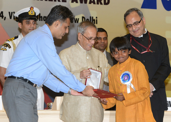 The President of India, Shri Pranab Mukherjee while presenting a 61st National Film Award at Vigyan Bhavan in New Delhi on May 3, 2014. Also seen is the Union Minister of State (Independent Charge) of the Ministry of Information and Broadcasting, Shri Ma 