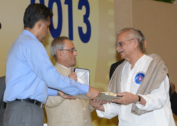 The President of India, Shri Pranab Mukherjee presenting Dadasaheb Phalke Award to Shri Gulzaar at the 61st National Film Award ceremony at Vigyan Bhavan in New Delhi on May 3, 2014. Also seen is the Union Minister of State (Independent Charge) of the Min 