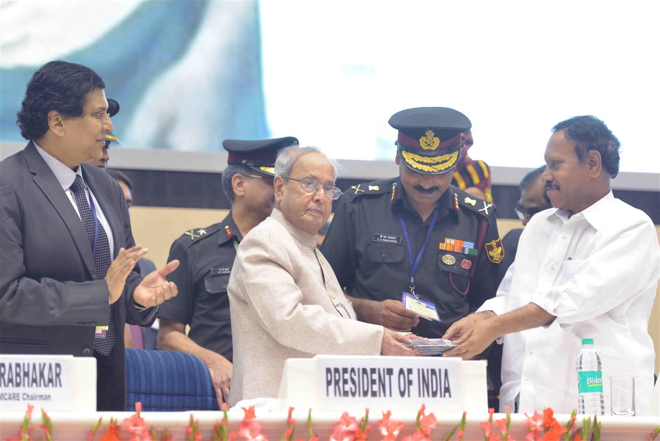 The Deputy Speaker of Lok Sabha, Dr. M. Thambidurai releasing the CD on “Release of Guidelines & Resources Materials for the Telemedicine Centres of Armed Forces from Summit” and first copy presented to the President of India, Shri Pranab Mukherjee at the