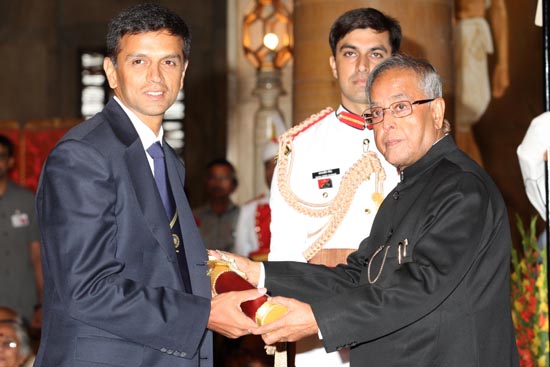 The President of India, Shri Pranab Mukherjee conferring the Padma Bhushan on Shri Rahul Dravid at the Darbar Hall of Rashtrapati Bhavan in New Delhi on April 5, 2013..