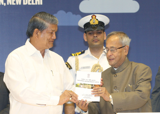 The first copy of the National Water Policy Document -2012 released by the Union Minister of Water Resources, Shri Harish Rawat being presented to the President of India, Shri Pranab Mukherjee at Vigyan Bhavan in New Delhi on April 8, 2013 at the inaugura