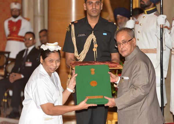 The President of India, Shri Pranab Mukherjee while presenting a National Florence Nightingale Award to Nursing Personnel on the occasion of International Nurses Day at Rashtrapati Bhavan in New Delhi on May 12, 2014. 