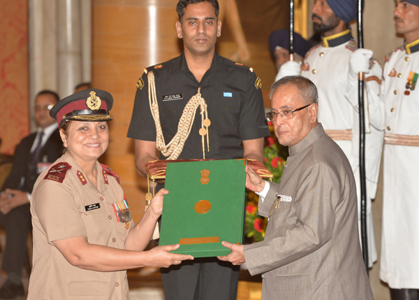 The President of India, Shri Pranab Mukherjee while presenting a National Florence Nightingale Award to Nursing Personnel on the occasion of International Nurses Day at Rashtrapati Bhavan in New Delhi on May 12, 2014. 