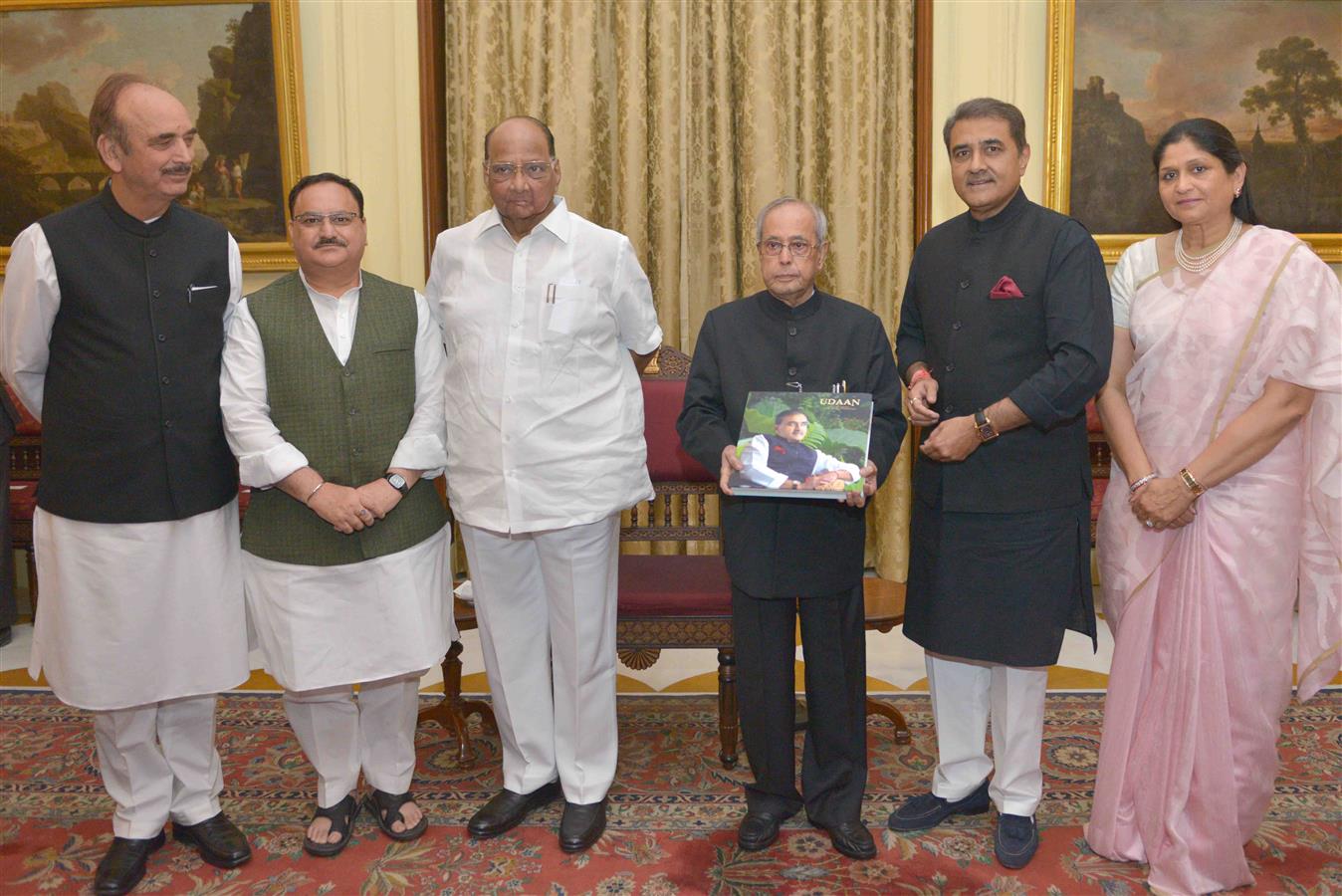 The President of India, Shri Pranab Mukherjee releasing the first copy of the pictorial biography of Shri Praful Patel, MP (RS) titled 'Udaan - A graphic glimpse through the life of Praful Patel' at Rashtrapati Bhavan on April 10, 2017.