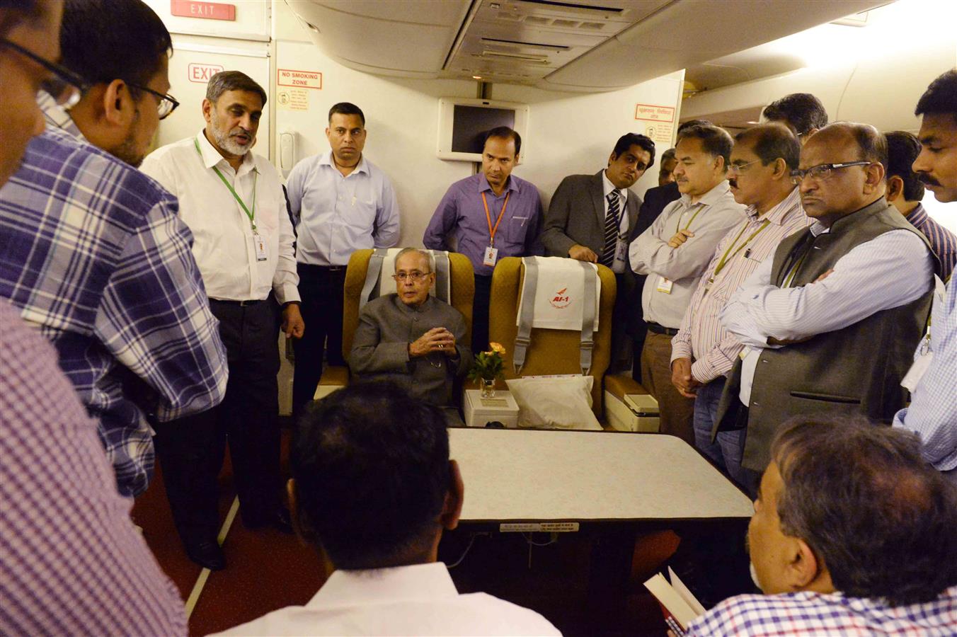 The President of India, Shri Pranab Mukherjee interacting with the accompanying officials and media delegation on board, Air India Special aircraft on his way to Papua New Guinea on April 27, 2016. 