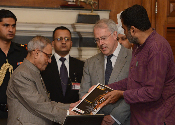 The President of India, Shri Pranab Mukherjee receiving the first copy of ‘QS Asia Pacific University Rankings 2014’ from Shri T.V. Mohandas Pai, Chairman, Indian Centre for Assessment and Accreditation at Rashtrapati Bhavan in New Delhi on May 12, 2014. 