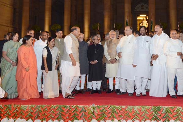 The President of India, Shri Pranab Mukherjee, the Vice President of India, Shri Mohd. Hamid Ansari and the Prime Minister of India, Shri Narendra Damodardas Modi with newly sworn-in Ministers at the Forecourt of Rashtrapati Bhavan in New Delhi on May 26, 