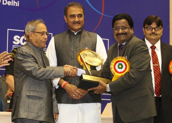 The President of India, Shri Pranab Mukherjee presenting the Standing Conference of Public Enterprises (SCOPE) Meritorious Awards on the occasion of Fourth Public Sector Day at Vigyan Bhavan in New Delhi on April 26, 2013. Also seen is the Union Minister