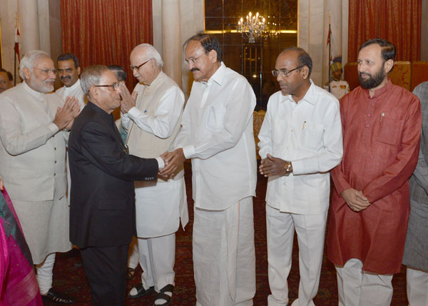 The President of India, Shri Pranab Mukherjee, the Prime Minister of India, Shri Narendra Damodardas Modi at the dinner hosted by the President at Rashtrapati Bhavan in New Delhi on May 28, 2014 for the Prime Minister and the Union Council of Ministers. 