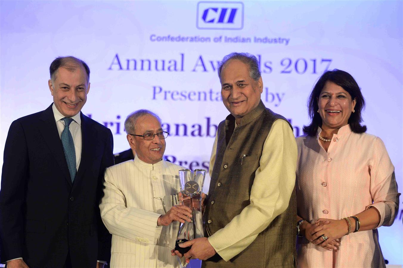 The President of India, Shri Pranab Mukherjee presenting the CII President's Award for Lifetime Achievement to Shri Rahul Bajaj, Chairman, Bajaj Auto Limited in New Delhi on April 27, 2017.