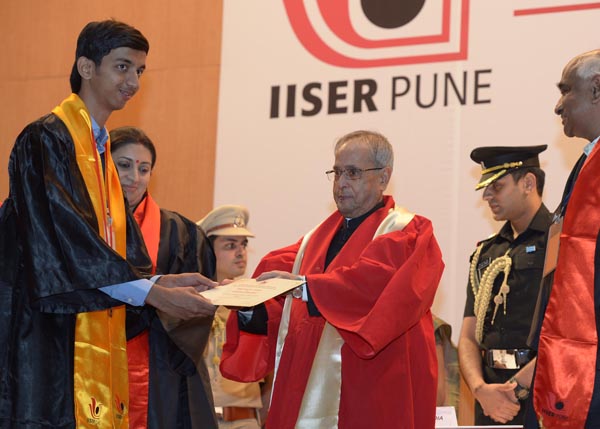 The President of India, Shri Pranab Mukherjee while presenting a degree to the student at the third Convocation of the Indian Institute of Science Education and Research (IISER), Pune at Pune in Maharashtra on June 15, 2014. Also seen is the Union Ministe 