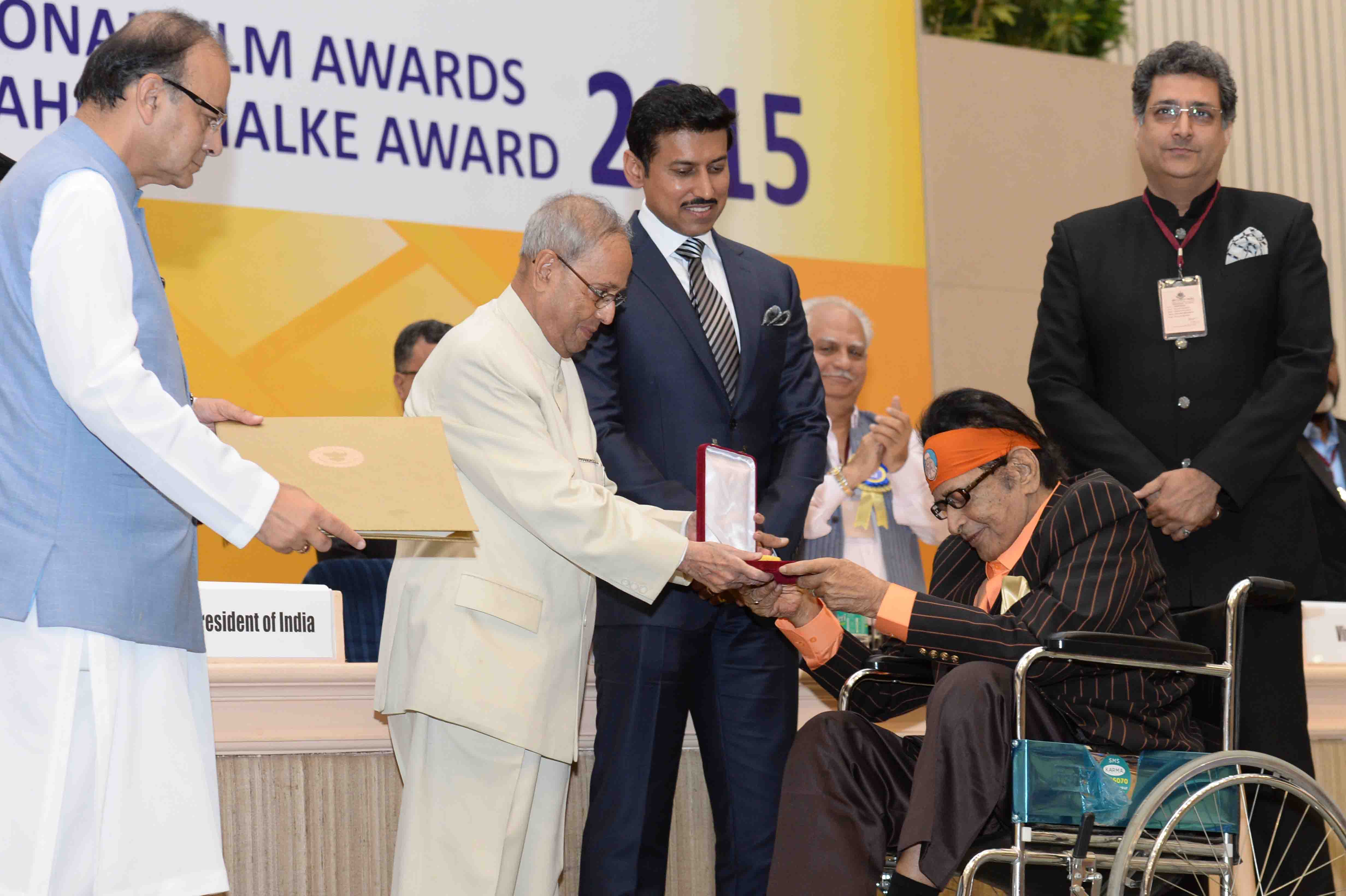 The President, Shri Pranab Mukherjee presenting the Dada Saheb Phalke Award to Actor Shri Manoj Kumar at the 63rd National Film Awards Function in New Delhi on May 03, 2016. 