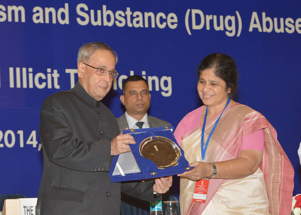 The President of India, Shri Pranab Mukherjee while presenting a National Award for Outstanding Services in the Field of Prevention of Alcoholism and Substance (Drug) Abuse at Vigyan Bhavan in New Delhi on June 26, 2014 on the occasion of International Da 