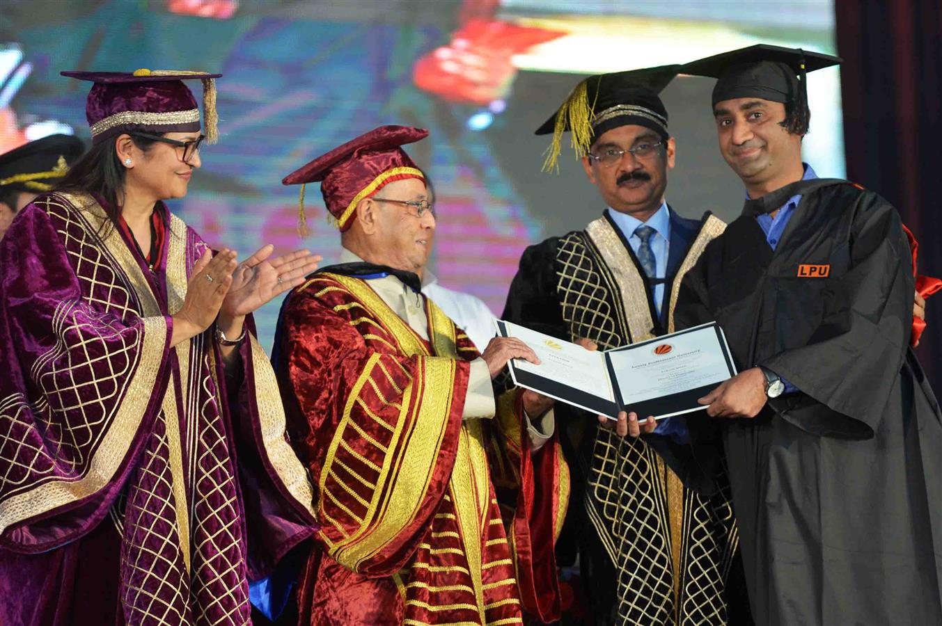 The President of India, Shri Pranab Mukherjee presenting the degree to a student at the 8th Convocation of the Lovely Professional University (LPU) at Phagwara in Punjab on May 2, 2017.