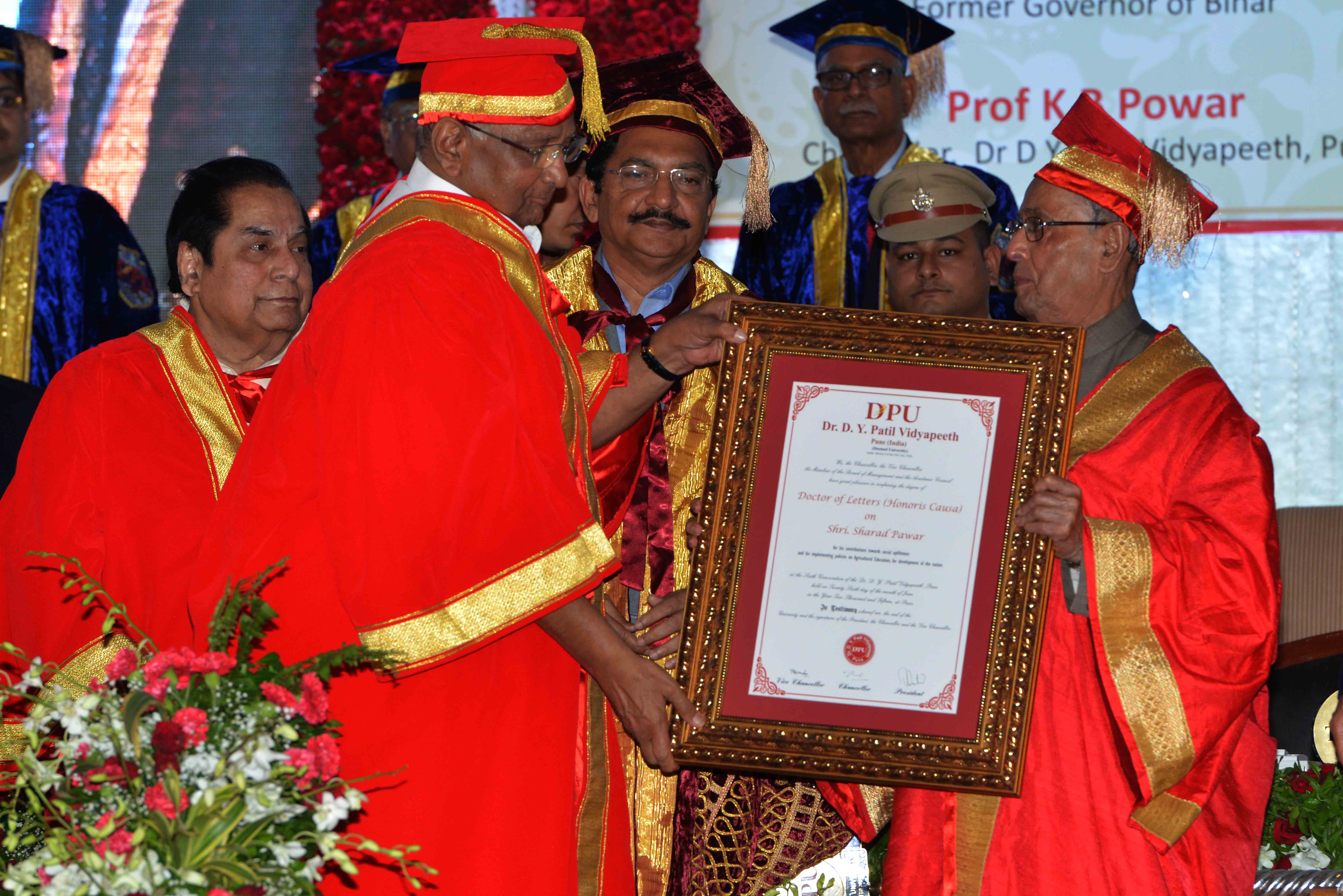 The President of India, Shri Pranab Mukherjee conferring Honoris Causa (D. Litt) to Shri Sharad Pawar, MP (Rajya Sabha) at the Sixth Convocation of Dr. D.Y. Patil Vidyapeeth at Pune on June 26, 2015.