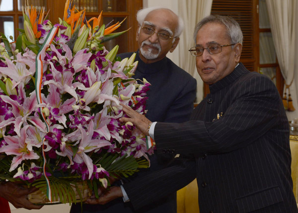 The Vice President of India, Shri Mohd. Hamid Ansari calling-on the President of India, Shri Pranab Mukherjee at Rashtrapati Bhavan in New Delhi on January 1, 2014 on the occasion of New Year's day. 