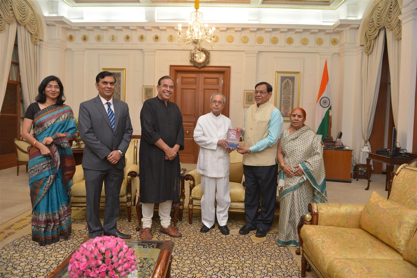 The President of India, Shri Pranab Mukherjee receiving the book "Aadhunik Bharat Me Police Vyavastha" from Dr.RLS Yadav at Rashtrapati Bhavan on May 17, 2016. 