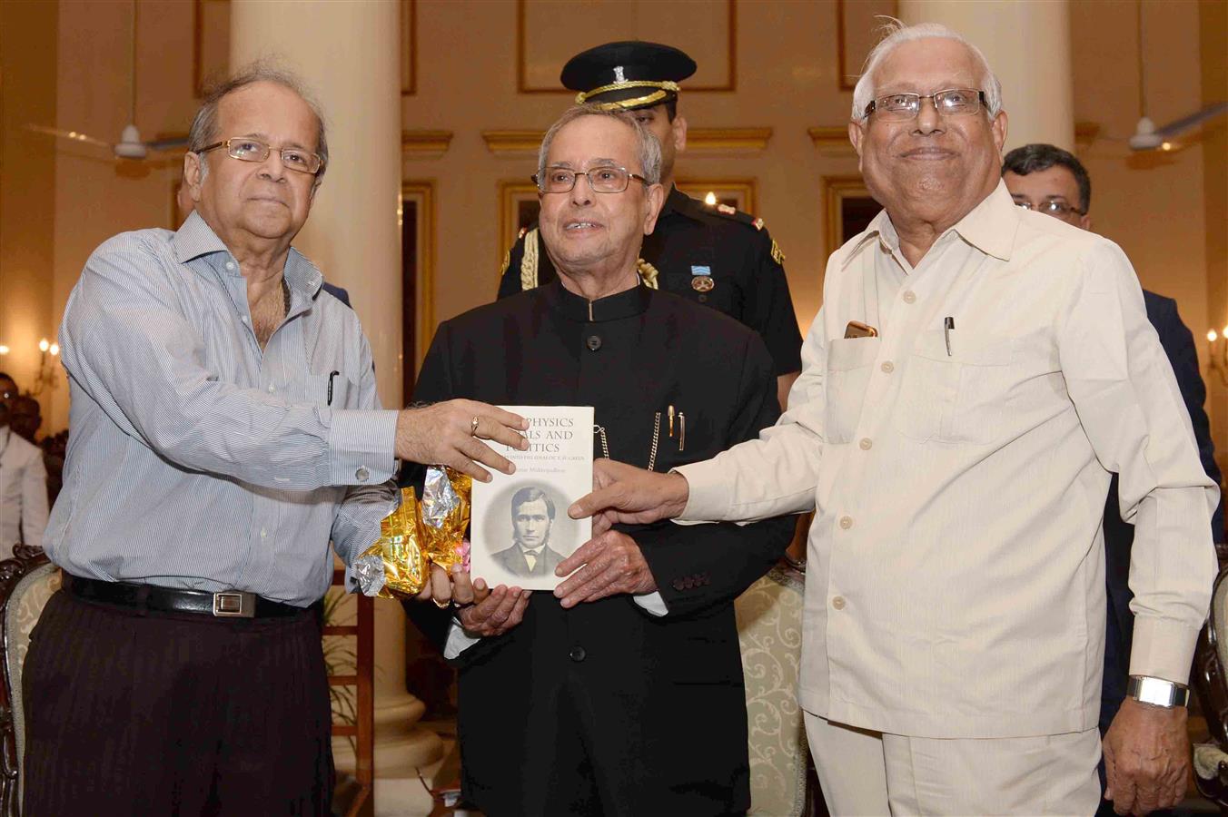 The President of India, Shri Pranab Mukherjee receiving the first copy of book ‘Metaphysics, Morals and Politics’ from Prof. Amal Kumar Mukhopadhyay at Kolkata in West Bengal on today (May 18, 2017.