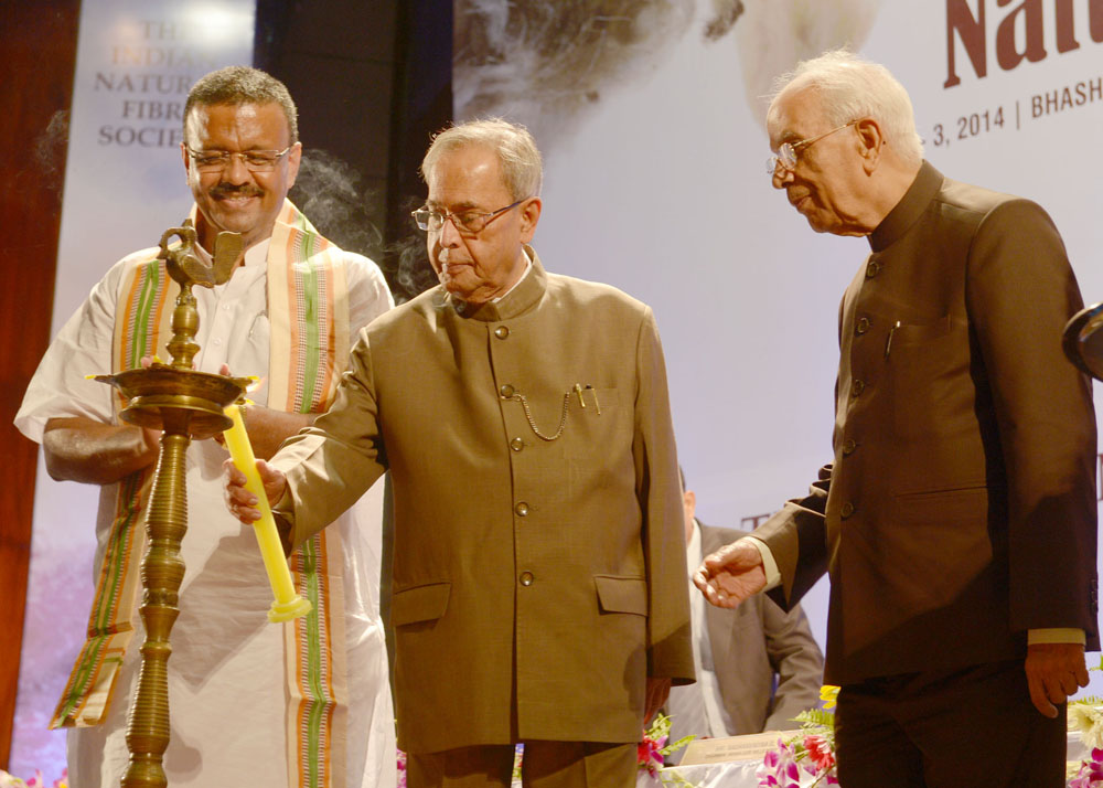 The President of India, Shri Pranab Mukherjee lighting the lamp to inaugurate the International Conference on Natural Fibres organized by the National Institute of Research on Jute and Allied Fibre Technology at Kolkata on August 1, 2014. 