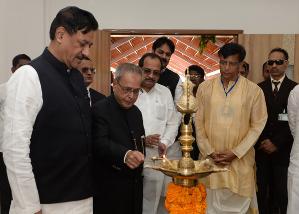 The President of India, Shri Pranab Mukherjee lighting the lamp at the inauguration of New Building & Exhibition at Krishi Vigyan Kendra at Malegaon in Maharashtra on January 19, 2014. 