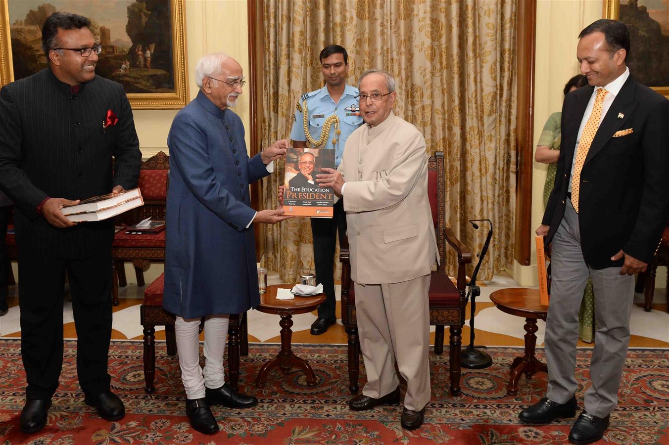 The President of India, Shri Pranab Mukherjee receiving the first copy of the book "The Education President" published by the International Institute for Higher Education Research of the OP Jindal Global University at Rashtrapati Bhavan on June 08,2016. 