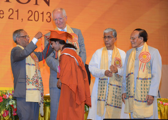 The President of India, Shri Pranab Mukherjee presenting a Gold Medal to one of the graduating students at the 5th convocation of National Institute of Technology at Agartala in Tripura on June 21, 2013.