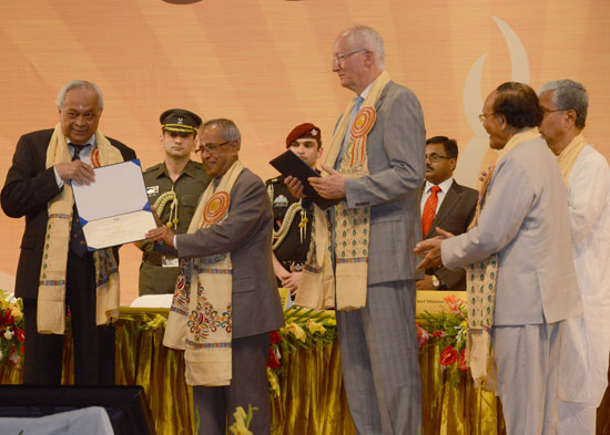 The President of India, Shri Pranab Mukherjee presenting Honoris Causa D (Science) to the eminent Indian Physicist, Prof. Bikash Sinha at the 5th convocation of National Institute of Technology at Agartala in Tripura on June 21, 2013.