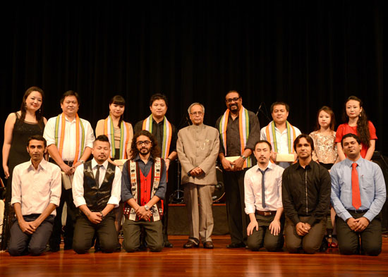 he President of India, Shri Pranab Mukherjee with the artists after witnessing the performance by the 'Ao Naga Choir' at Rashtrapati Bhavan Auditorium in New Delhi on June 22, 2013.