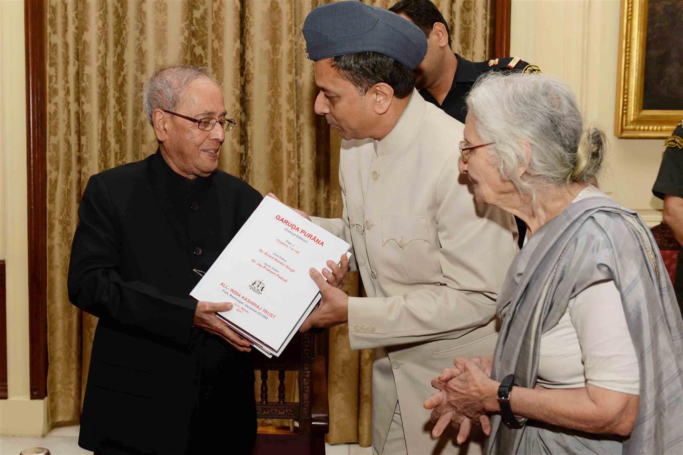 The President of India, Shri Pranab Mukherjee receiving the first copy of book ‘Garuda Purana’ (Critical Edition) published by All India Kashiraj Trust at Rashtrapati Bhavan on June 19, 2017.