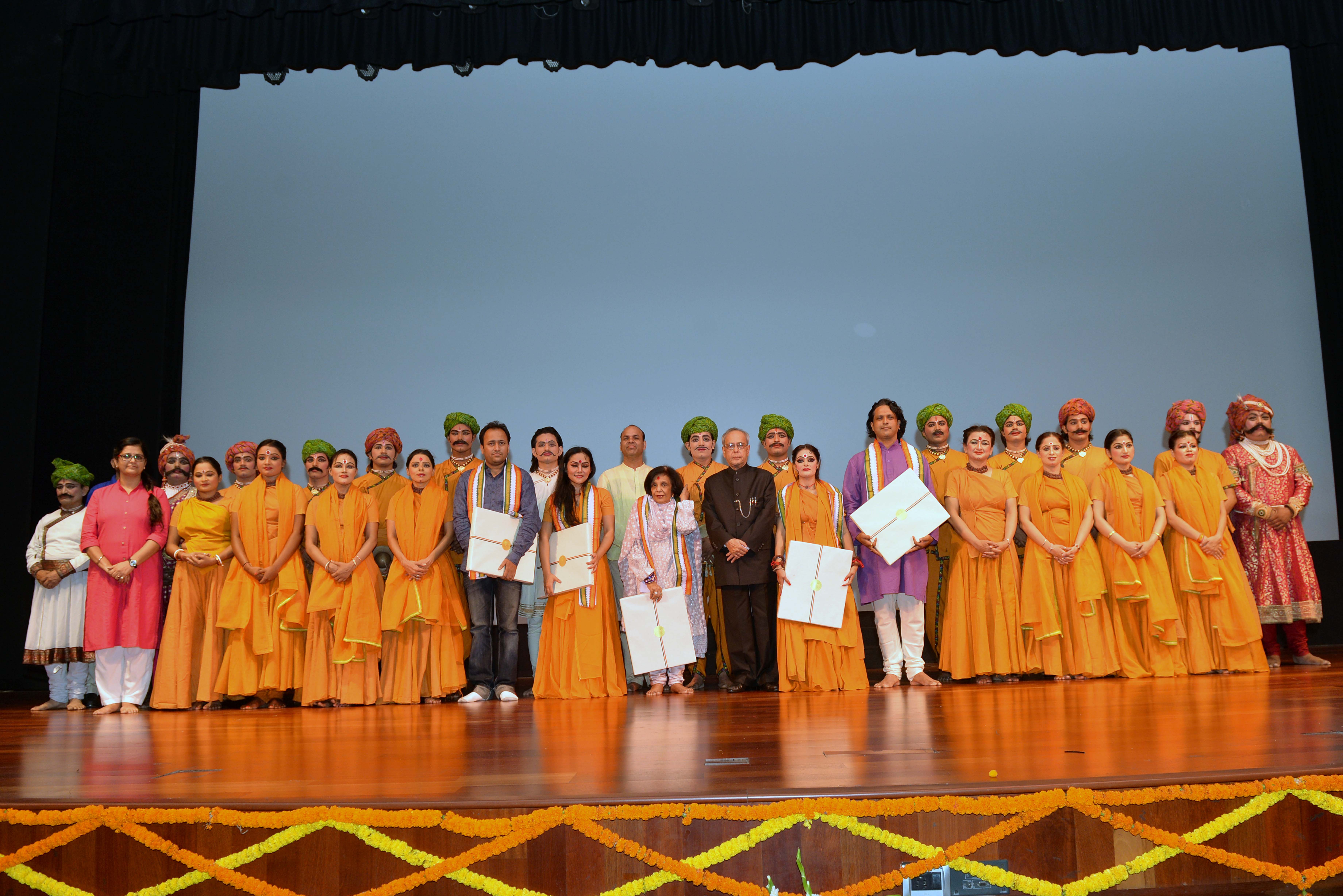 The President of India, Shri Pranab Mukherjee with artists after witnessing a Ballet Performance 'Meera' by Shriram Bharatiya Kala Kendra at Rashtrapati Bhavan Auditorium on September 06, 2015.