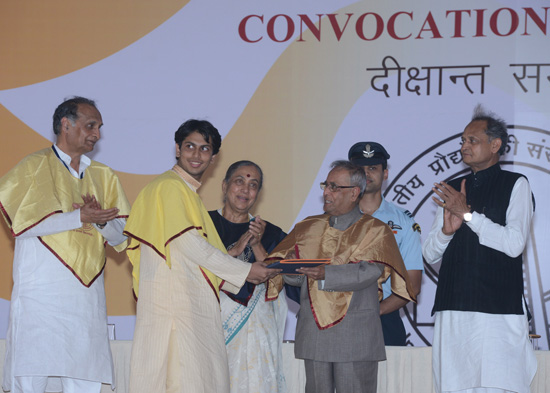 The President of India, Shri Pranab Mukherjee while presenting a degree to the student at the First Convocation of Indian Institute of Technology, Jodhpur in Rajasthan on July 10, 2013. Also seen are the Governor of Rajasthan, Smt. Margaret Alva and the C