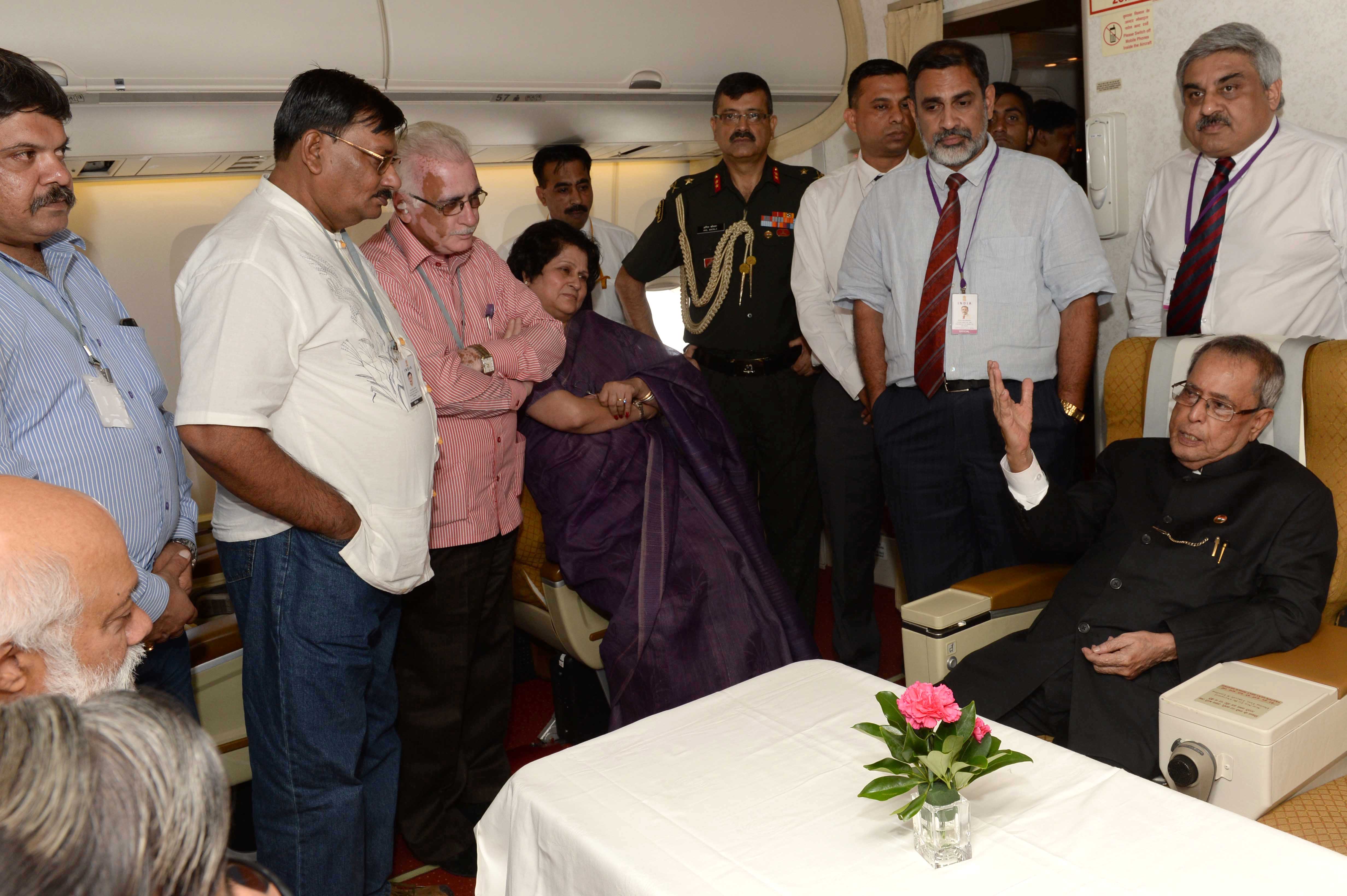 The President of India, Shri Pranab Mukherjee addressing the media on board his Special Aircraft on his way to Hanoi for his State Visit to Vietnam on September 14, 2014 