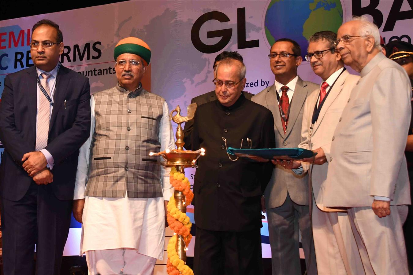 The President of India, Shri Pranab Mukherjee lighting the lamp at the inaugural session of Global Summit on ‘Academics & Economic Reforms – Role of Cost & Management Accountants’ organized by the Institute of Cost Accountants of India (ICAI) at Kolkata i